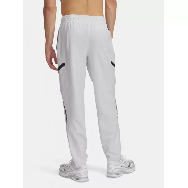  Pánské sportovní kalhoty UNDER ARMOUR UA UNSTOPPABLE CARGO PANT 1390256-014 šedá 