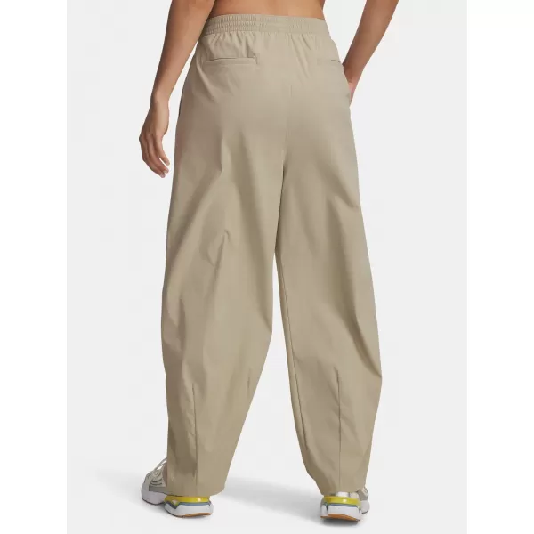  Dámské sportovní kalhoty UNDER ARMOUR UA UNSTOPPABLE WVN PLEAT PT 6007027-299 HNĚDÁ 