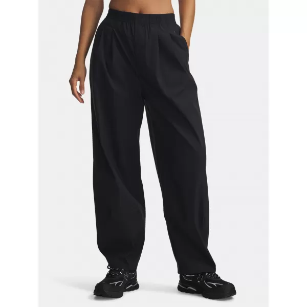  Dámské sportovní kalhoty UNDER ARMOUR UA UNSTOPPABLE WVN PLEAT PT 6007027-001 ČERNÁ 