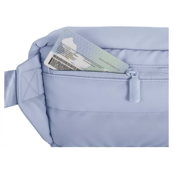  Ledvinka HEYS PUFFER WAIST BAG LIGHT BLUE 