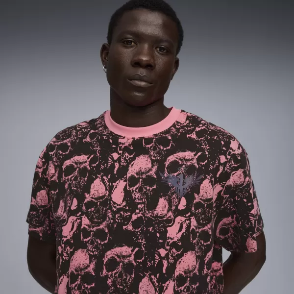  Pánské triko PUMA WORLD TOUR-NAMENT AOP TEE 63235601 SUN STRUCK/AOP 
