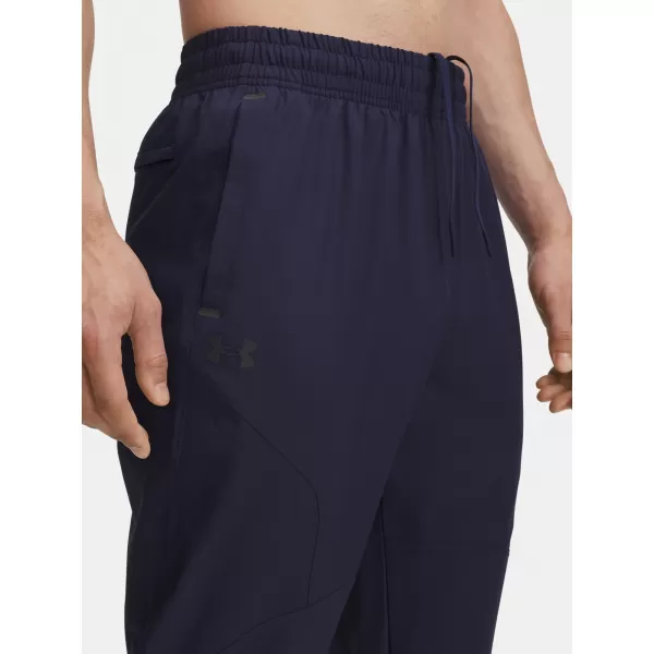 Pánské sportovní kalhoty UNDER ARMOUR UA UNSTOPPABLE TAPERED PANTS 6003861-410 MODRÁ 