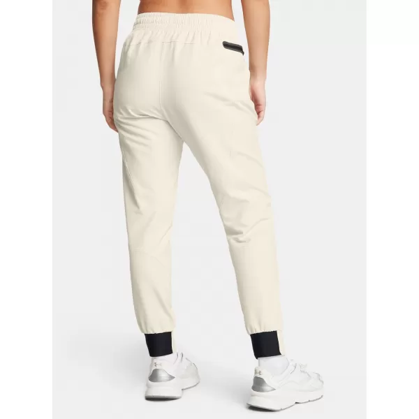  Dámské tepláky UNDER ARMOUR UA UNSTOPPABLE JOGGER 1376926-110 BÍLÁ 