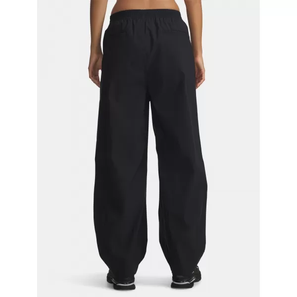  Dámské sportovní kalhoty UNDER ARMOUR UA UNSTOPPABLE WVN PLEAT PT 6007027-001 ČERNÁ 