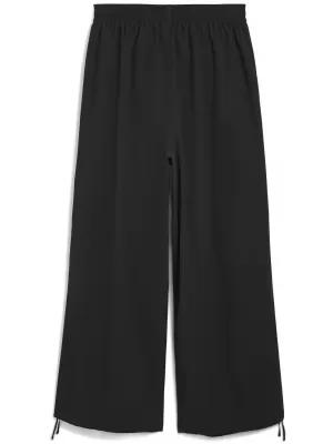 Pánské kalhoty PUMA WARDROBE ESS OVERSIZED PARACHUTE PANTS WV OP 63206801 PUMA BLACK