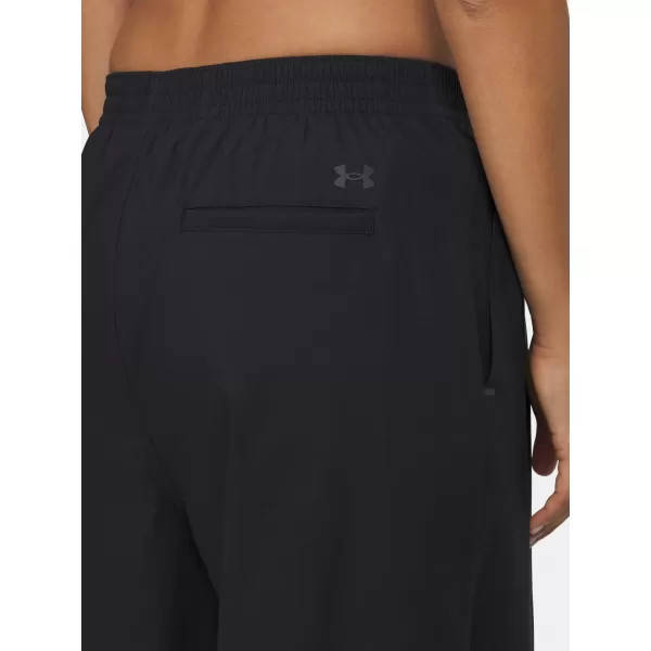  Dámské sportovní kalhoty UNDER ARMOUR UA UNSTOPPABLE WVN PLEAT PT 6007027-001 ČERNÁ 
