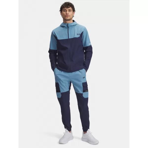  Pánské sportovní kalhoty UNDER ARMOUR UA TECH UTILITY WOVEN PANT 6004966-403 MODRÁ 