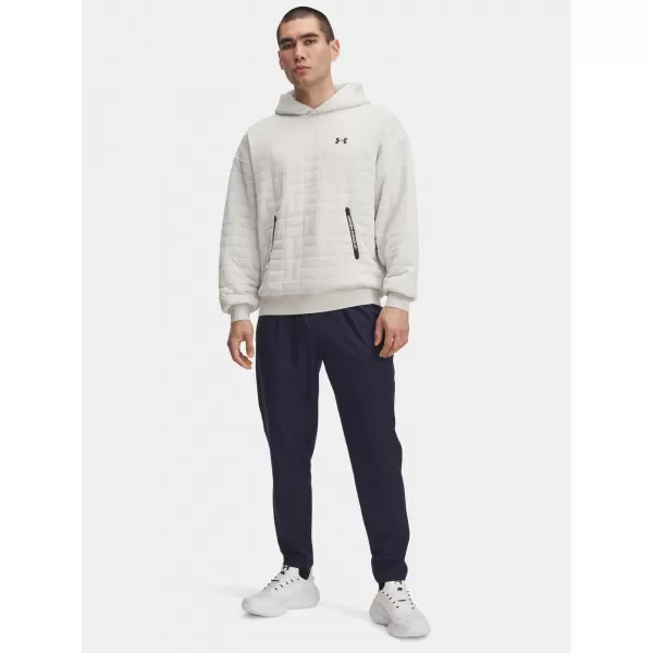  Pánské sportovní kalhoty UNDER ARMOUR UA UNSTOPPABLE TAPERED PANTS 6003861-410 MODRÁ 