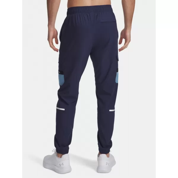  Pánské sportovní kalhoty UNDER ARMOUR UA TECH UTILITY WOVEN PANT 6004966-403 MODRÁ 