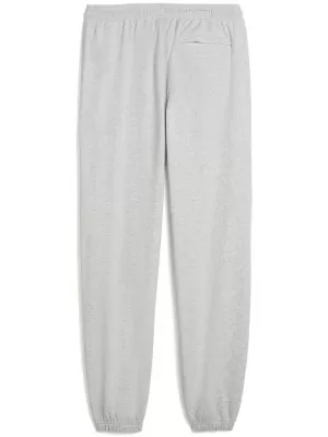 Pánské tepláky PUMA M GRAPHIC FRENCH TERRY JOGGER 52770304 LIGHT GRAY HEATHER