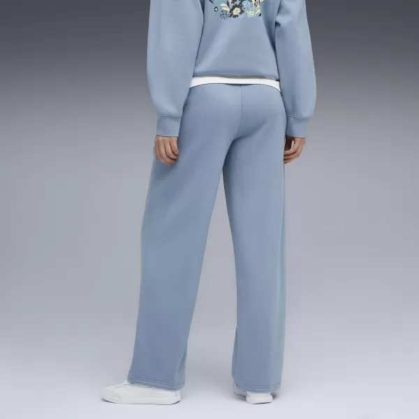  Dámské tepláky PUMA ESS NATURE 2 0 COMFORT LOGO STRAIGHT PANTS FL OP 68808134 COOL BLUE 