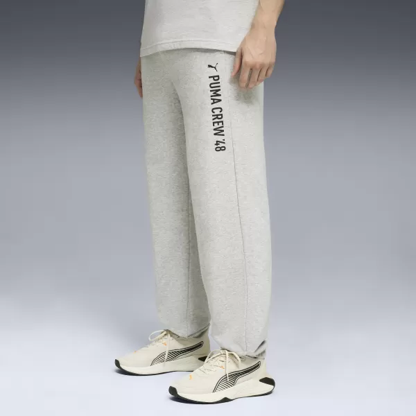  Pánské tepláky PUMA M GRAPHIC FRENCH TERRY JOGGER 52770304 LIGHT GRAY HEATHER 
