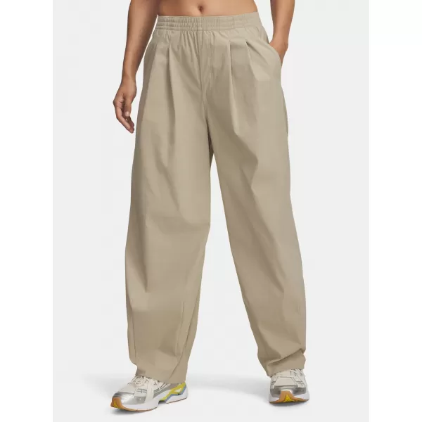 Dámské sportovní kalhoty UNDER ARMOUR UA UNSTOPPABLE WVN PLEAT PT 6007027-299 HNĚDÁ 