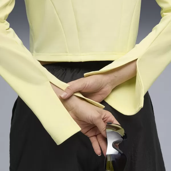  Dámské bunda PUMA DARE TO SLIM CROPPED TRACK JACKET 63214635 GOLD MOON 