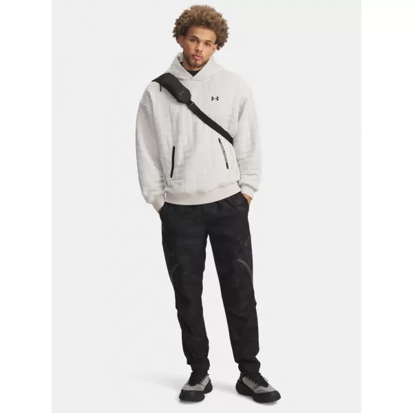  Pánské sportovní kalhoty UNDER ARMOUR UA UNSTOPPABLE CARGO PANT 1390256-003 ČERNÁ 