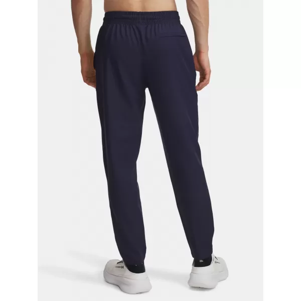  Pánské sportovní kalhoty UNDER ARMOUR UA UNSTOPPABLE TAPERED PANTS 6003861-410 MODRÁ 