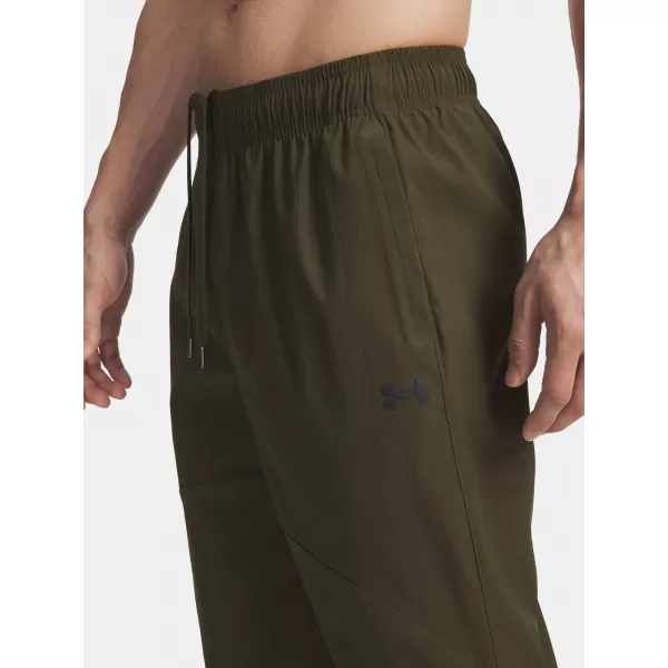  Pánské sportovní kalhoty UNDER ARMOUR UA UNSTPBLE WOVEN TX TAPER 6003865-308 ZELENÁ 