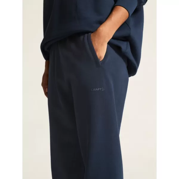  Dámské těžké tepláky CRAFT Corp. Frequent Sweatpants W OHNIVÁ 