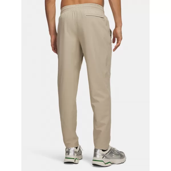  Pánské sportovní kalhoty UNDER ARMOUR UA UNSTOPPABLE TAPERED PANTS HNĚDÁ 