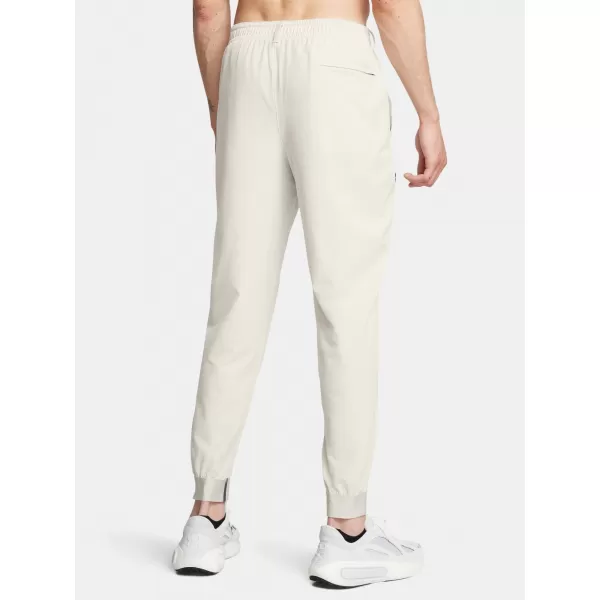  Pánské tepláky UNDER ARMOUR UNSTOPPABLE JOGGERS 1388823-110 BÍLÁ 