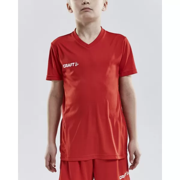  Dětské sportovní tričko s výstřihem do V CRAFT TW Squad Go Jersey Solid Jr JASNĚ ČERVENÁ 