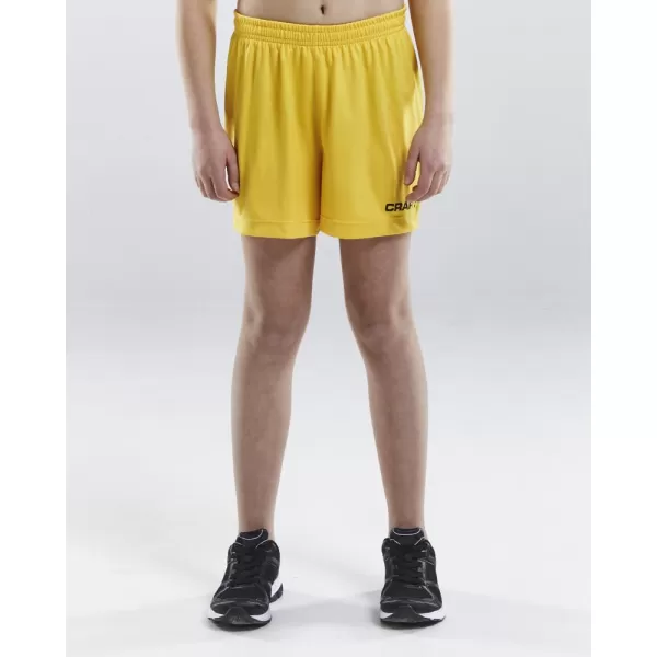  Dětské sportovní kraťasy CRAFT TW Squad Go Short Solid Jr ŠVÉDSKÁ ŽLUTÁ 