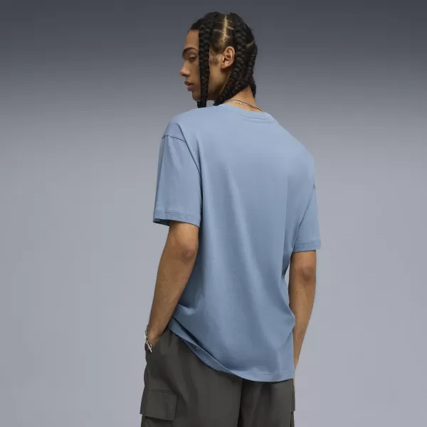  Pánské triko PUMA GRAPHIC WORLD TOUR TEE 632112-34 COOL BLUE 