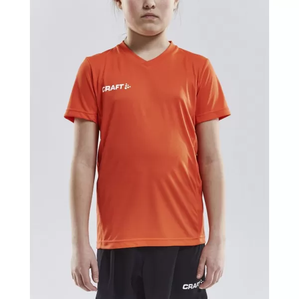  Dětské sportovní tričko s výstřihem do V CRAFT TW Squad Go Jersey Solid Jr KOKTEJLOVÁ 