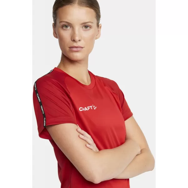  Dámské kontrastní sportovní tričko CRAFT TW Squad Go Contrast Jersey W JASNĚ ČERVENÁ/EXPRES 