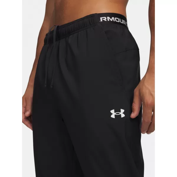  Pánské sportovní kalhoty UNDER ARMOUR VANISH TRAINING PANT 6010606-001 ČERNÁ 
