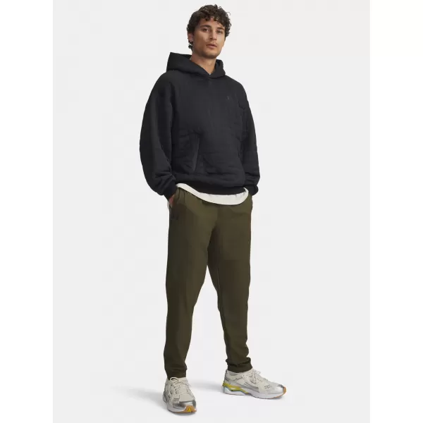  Pánské sportovní kalhoty UNDER ARMOUR UA UNSTOPPABLE TAPERED PANTS 6003861-308 ZELENÁ 