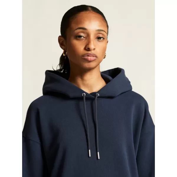  Dámská mikina s kapucí CRAFT Corp. Frequent Hoodie W OHNIVÁ 