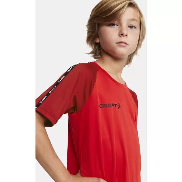  Dětské kontrastní sportovní tričko CRAFT TW Squad Go Contrast Jersey Jr JASNĚ ČERVENÁ/EXPRES 