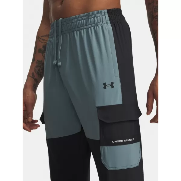  Pánské sportovní kalhoty UNDER ARMOUR UA TECH UTILITY WOVEN PANT 6004966-002 ČERNÁ 
