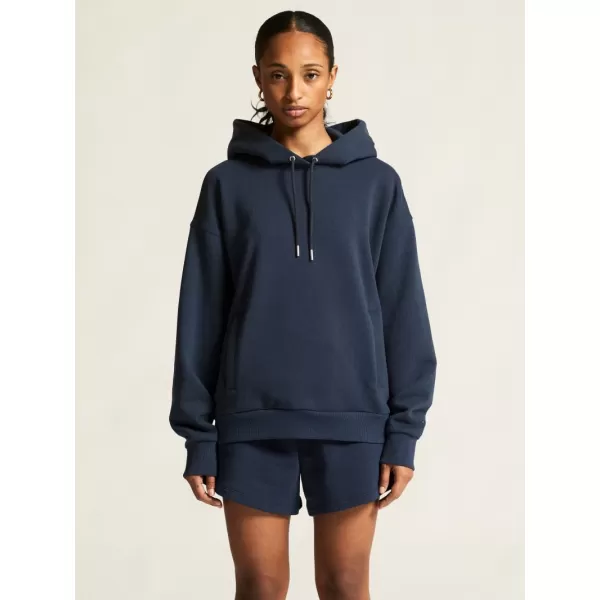  Dámská mikina s kapucí CRAFT Corp. Frequent Hoodie W OHNIVÁ 