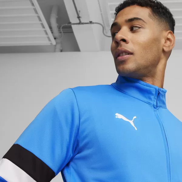  Pánská tepláková souprava PUMA TEAMRISE TRACKSUIT 658653_02 IGNITE BLUE/PUMA BLACK 