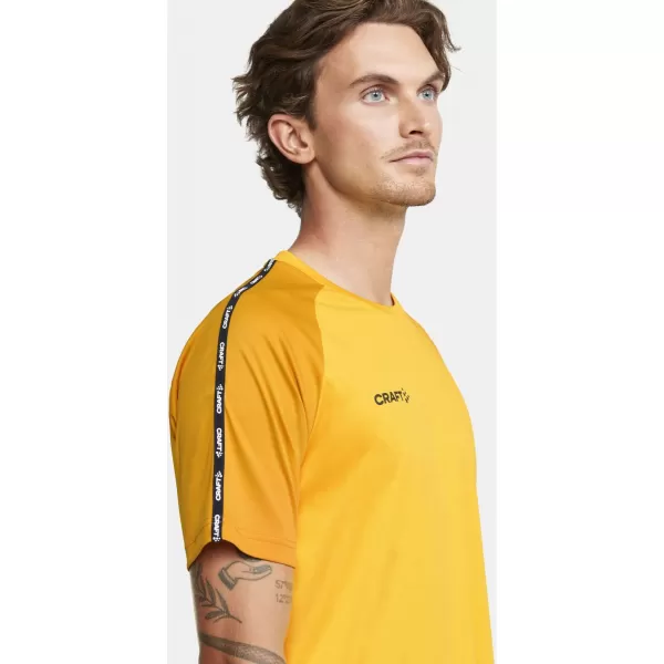  Pánské kontrastní sportovní tričko CRAFT TW Squad Go Contrast Jersey M ŠVÉDSKÁ ŽLUTÁ/ZLATÁ 