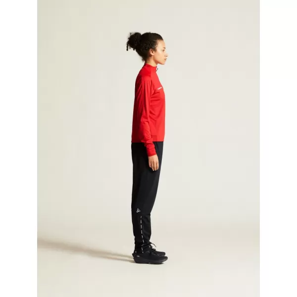  Dámská tréninková bunda s 1/4 zipem CRAFT TW Evolve 2.0 Half Zip W JASNĚ ČERVENÁ 