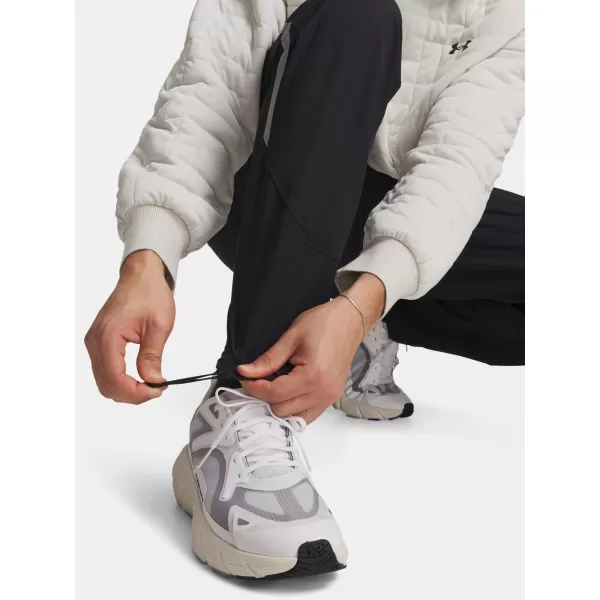 Pánské sportovní kalhoty UNDER ARMOUR UNSTOPPABLE CARGO PANT 1390256-004 ČERNÁ 