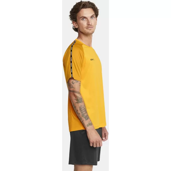  Pánské kontrastní sportovní tričko CRAFT TW Squad Go Contrast Jersey M ŠVÉDSKÁ ŽLUTÁ/ZLATÁ 