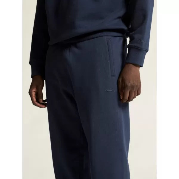  Pánské těžké tepláky CRAFT Corp. Frequent Sweatpants M OHNIVÁ 