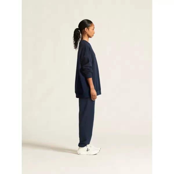  Dámské těžké tepláky CRAFT Corp. Frequent Sweatpants W OHNIVÁ 