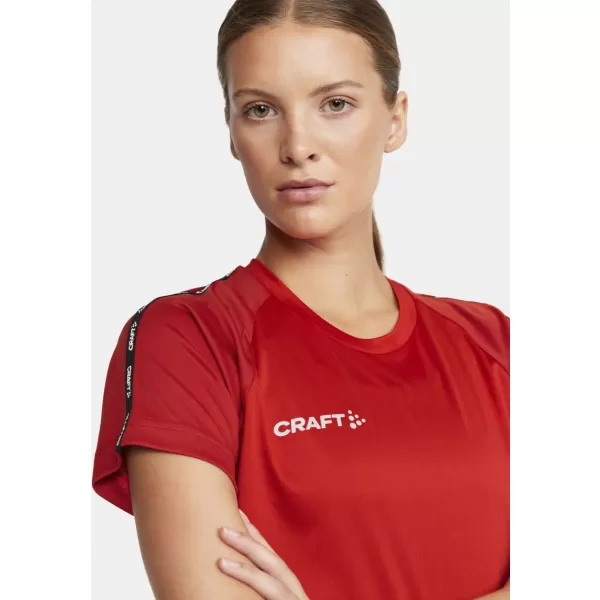  Dámské kontrastní sportovní tričko CRAFT TW Squad Go Contrast Jersey W JASNĚ ČERVENÁ/EXPRES 