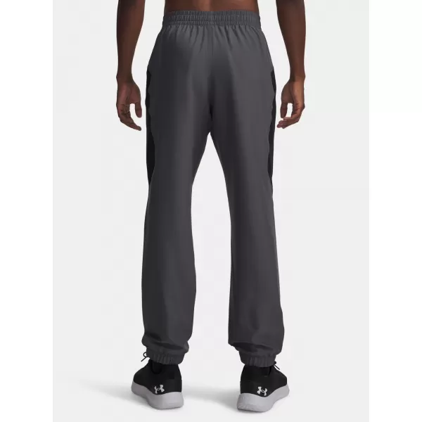  Pánské sportovní kalhoty UNDER ARMOUR TECH SPORT PANT 6011268-025 ŠEDÁ 