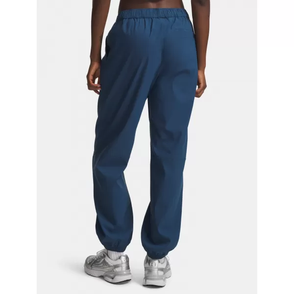  Dámské tepláky UNDER ARMOUR UNSTOPPABLE WVN JOGGER 6011400-498 MODRÁ 