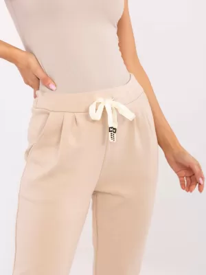 Dámské kalhoty ITALY MODA DHJ-SP-9283.83P BEIGE