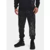 Pánské tepláky UNDER ARMOUR RIVAL FLC CAMO SCRIPT JGR 1366313-001 ČERNÁ
