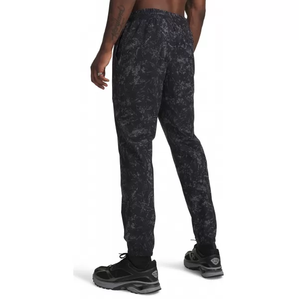  Pánské tepláky UNDER ARMOUR VIBE WOVEN JOGGER 1386557-008 ČERNÁ 