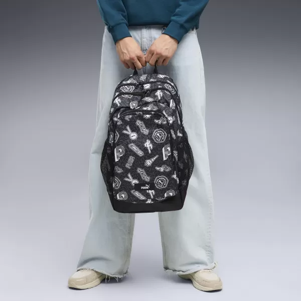  Batoh PUMA ACADEMY AOP BACKPACK 09115025 PUMA BLACK/RUNNING ICONS AOP 