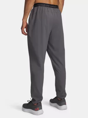 Pánské sportovní kalhoty UNDER ARMOUR VANISH TRAINING PANT 6010606-025 ŠEDÁ